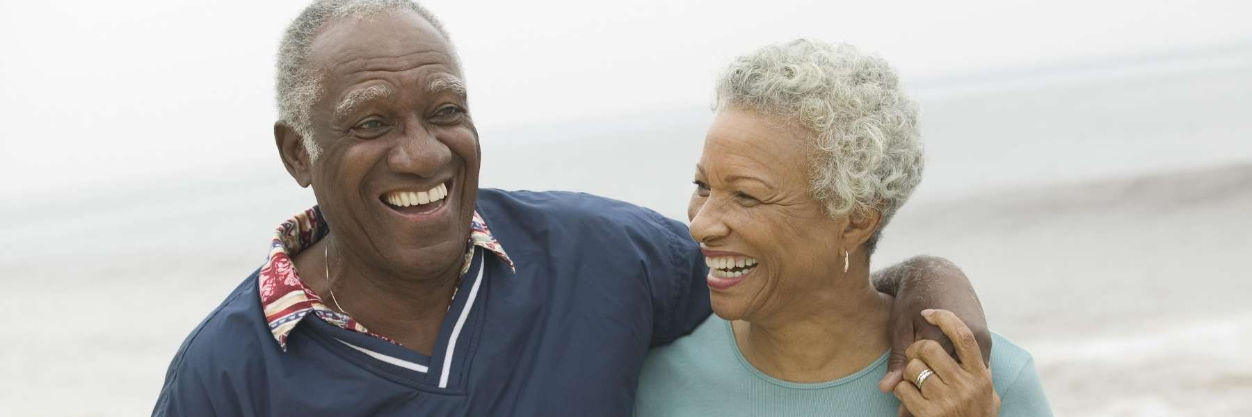 older couple hugging | cosmetic dentist wilmington
