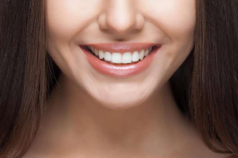 Brunette woman smiling, wilmington de