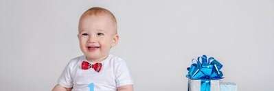 Baby with bowtie smiling, wilmington de