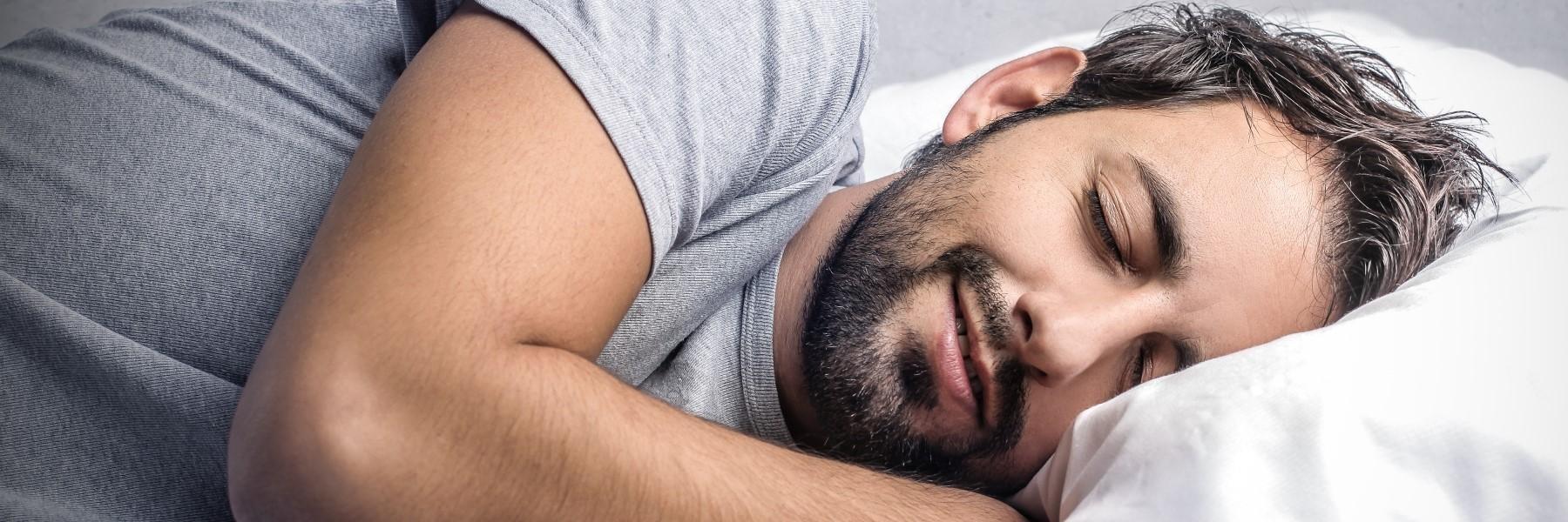 Man sleeping after sleep apnea treatment in Wilmington DE